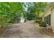 Private backyard with outbuilding is perfect for outdoor activities and relaxation at 11190 Hembree Springs Dr, Roswell, GA 30076