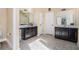 Bathroom featuring a double vanity with dark cabinets and neutral tile flooring at 3300 Allison Cir, Decatur, GA 30034