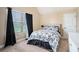 This bedroom offers neutral carpet and minimalist decor; simple and serene at 3300 Allison Cir, Decatur, GA 30034
