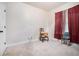 This bedroom offers neutral carpet and minimalist decor; simple and serene at 3300 Allison Cir, Decatur, GA 30034