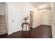 Inviting foyer with hardwood floors, stairway, and classic decor at 3300 Allison Cir, Decatur, GA 30034