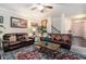 Inviting living room with large seating, beautiful area rug and stairway at 3300 Allison Cir, Decatur, GA 30034