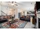 Spacious living room showcasing open floor plan to kitchen and plush leather seating at 3300 Allison Cir, Decatur, GA 30034
