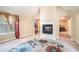 Bedroom featuring a fireplace, window with curtains, and neutral carpeting at 3300 Allison Cir, Decatur, GA 30034