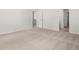Spacious bedroom has multiple closets and a neutral color palette at 3941 Fairhaven Rd, Lithia Springs, GA 30122