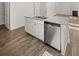 Stylish kitchen island with stainless steel dishwasher and granite countertop at 3941 Fairhaven Rd, Lithia Springs, GA 30122