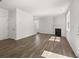 Bright living room features wood floors, fireplace, and ample natural light at 3941 Fairhaven Rd, Lithia Springs, GA 30122