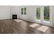 Cozy living room with a fireplace, hardwood flooring, and french doors at 3941 Fairhaven Rd, Lithia Springs, GA 30122