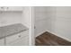 Well-organized walk-in pantry featuring wire shelving and hardwood floors at 3941 Fairhaven Rd, Lithia Springs, GA 30122