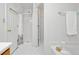 Bathroom features a shower and tub, a white shower curtain, and white fixtures at 3 Maplelake Dr, Acworth, GA 30101