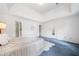 Bright bedroom boasts tray ceiling, plush carpet, a walk-in closet, and convenient access to an ensuite bathroom at 3 Maplelake Dr, Acworth, GA 30101