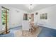 This cozy breakfast nook features a large window and space to enjoy a delicious meal at 3 Maplelake Dr, Acworth, GA 30101