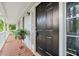 Inviting front door and covered porch, perfect for relaxing and enjoying the outdoors at 3 Maplelake Dr, Acworth, GA 30101