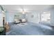 Living room featuring a fireplace, ceiling fan, and access to the dining room and hallway at 3 Maplelake Dr, Acworth, GA 30101