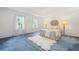 Spacious main bedroom featuring a tray ceiling, plush carpet, and bright natural light at 3 Maplelake Dr, Acworth, GA 30101