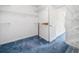 Walk-in closet provides ample storage space, metal racks, and plush carpeting at 3 Maplelake Dr, Acworth, GA 30101