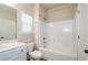Clean bathroom featuring a shower-tub combo and a vanity with a white countertop at 3405 Linstead Ct, Loganville, GA 30052