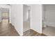 Clean hallway showcasing connections between rooms with modern design elements at 3933 Fairhaven Rd, Lithia Springs, GA 30122