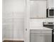 Pantry with wire shelving next to the kitchen with stainless steel appliances at 3933 Fairhaven Rd, Lithia Springs, GA 30122