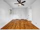 A bright, airy bedroom with hardwood floors, two closets, and ample natural light at 4274 Smithsonia Ct, Tucker, GA 30084