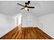 Bedroom featuring hardwood floors, a ceiling fan, and a closet with double doors at 4274 Smithsonia Ct, Tucker, GA 30084