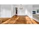 Dining room features hardwood floors and modern light fixture at 4274 Smithsonia Ct, Tucker, GA 30084
