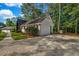 Charming home featuring a side-entry garage and a well-maintained driveway at 4274 Smithsonia Ct, Tucker, GA 30084