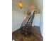 Inviting foyer featuring hardwood floors, a custom staircase, and decorative lighting at 4274 Smithsonia Ct, Tucker, GA 30084