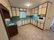 Functional kitchen with white appliances, neutral countertops, and ample cabinet space at 4274 Smithsonia Ct, Tucker, GA 30084