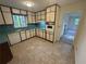 Functional kitchen with white appliances, neutral countertops, and ample cabinet space at 4274 Smithsonia Ct, Tucker, GA 30084