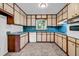 Compact kitchen with vintage appliances, light cabinets, and ample storage space at 4274 Smithsonia Ct, Tucker, GA 30084