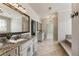 Spacious bathroom with granite counters, double sinks, and a luxurious soaking tub at 4830 Westgate Dr, Cumming, GA 30040