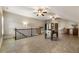 Spacious game room featuring a foosball table, wet bar area, and stylish laminate flooring for easy maintenance at 4830 Westgate Dr, Cumming, GA 30040