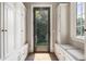 Well-organized mudroom featuring built-in storage cabinets, bench seating, and a convenient entrance at 4830 Westgate Dr, Cumming, GA 30040