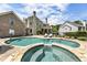 Backyard view of in-ground pool with lounge chairs and basketball hoop in a luxury outdoor space at 4830 Westgate Dr, Cumming, GA 30040