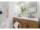 Elegant bathroom featuring a double vanity with modern fixtures and stylish mirrors at 1227 Epworth Sw St, Atlanta, GA 30310