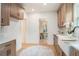 Bright kitchen featuring custom cabinetry, quartz countertops, and stainless steel appliances at 1227 Epworth Sw St, Atlanta, GA 30310