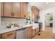 Well-appointed kitchen with stainless steel appliances, a farmhouse sink, and stylish finishes at 1227 Epworth Sw St, Atlanta, GA 30310