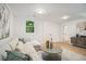 Inviting living room with comfortable seating, natural light, and a stylish coffee table at 1227 Epworth Sw St, Atlanta, GA 30310