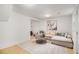 Bright living room featuring an area rug, neutral tones, and natural lighting at 1227 Epworth Sw St, Atlanta, GA 30310