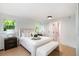 Bright main bedroom featuring stylish decor, a cushioned bench, and modern finishes at 1227 Epworth Sw St, Atlanta, GA 30310