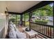 Inviting front porch with comfortable seating and a view of the neighborhood at 1227 Epworth Sw St, Atlanta, GA 30310