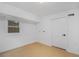 Bright room with wood floors, neutral walls and baseboards, and a window at 1227 Epworth Sw St, Atlanta, GA 30310