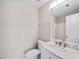 Bathroom featuring marble countertop, brushed nickel fixtures and toilet at 2138 Mill Garden Run, Buford, GA 30519