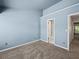 Bedroom with high ceilings, neutral walls, and a connecting bathroom at 2138 Mill Garden Run, Buford, GA 30519