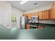 Kitchen view with stainless steel appliances and countertops at 2138 Mill Garden Run, Buford, GA 30519
