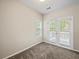 Inviting room with natural light from windows and access to a private balcony at 2138 Mill Garden Run, Buford, GA 30519