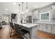Kitchen with an island, stainless appliances, granite countertops, and hardwood floors at 2428 Mills Bnd, Decatur, GA 30034