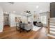 Spacious living room with hardwood floors, fireplace, and sliding glass doors leading to outdoor space at 2428 Mills Bnd, Decatur, GA 30034