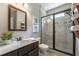 Clean bathroom with a glass shower, marble countertops, and a modern vanity at 3825 Valleyway Rd, Cumming, GA 30040
